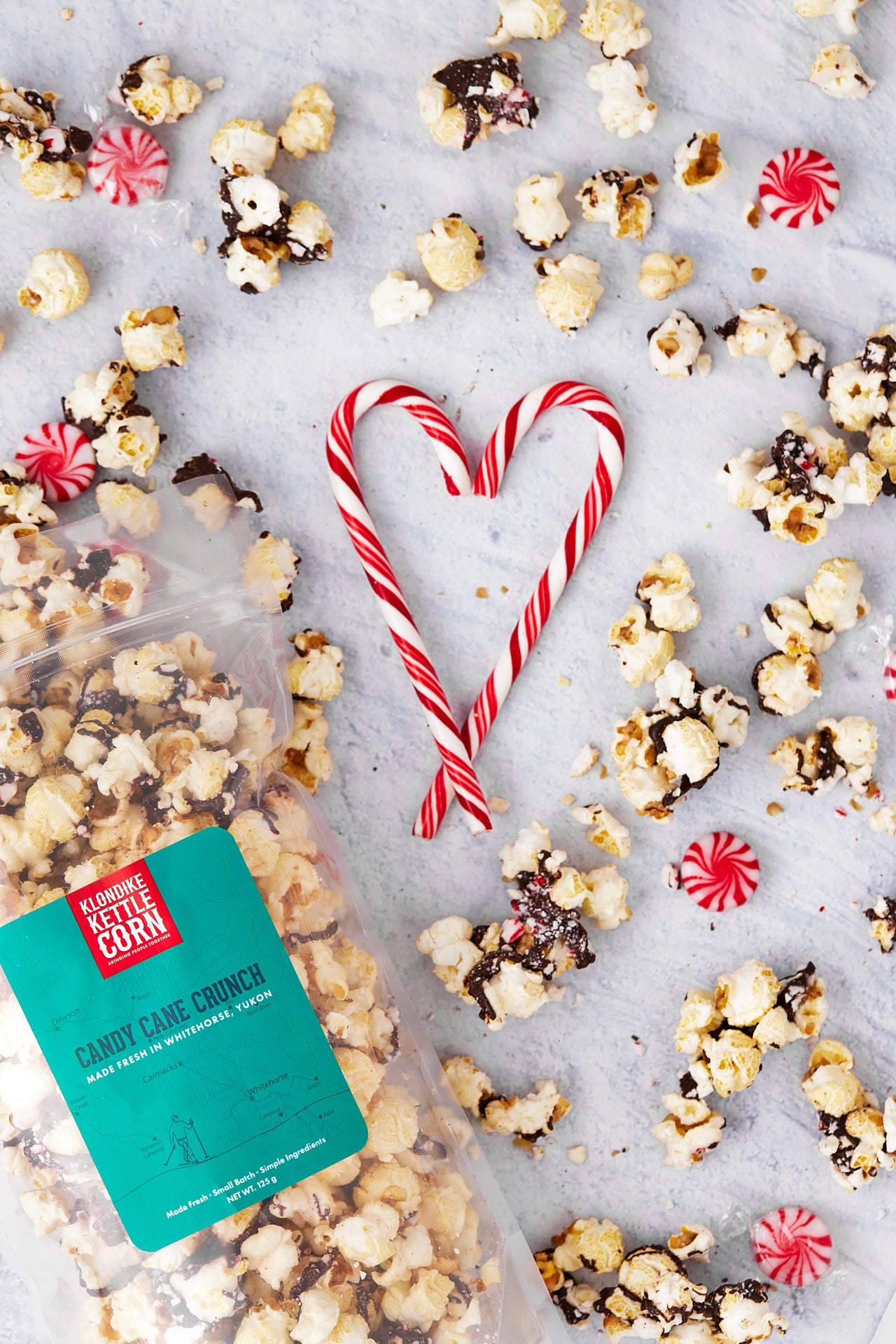 Candy Cane Crunch (chocolate drizzle) popcorn